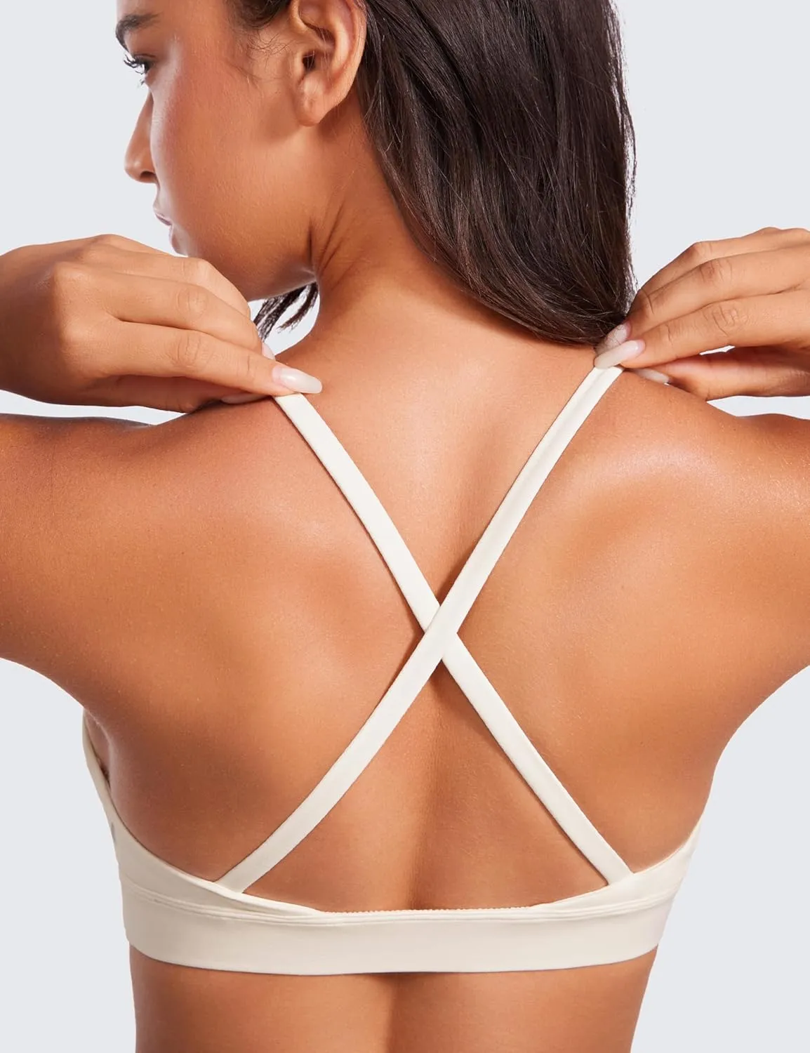 CRZ YOGA Butterluxe Deep V-Neck Sports Bras for Women - Spaghetti Strap Criss Cross Padded Top Low Coverage Wireless Yoga