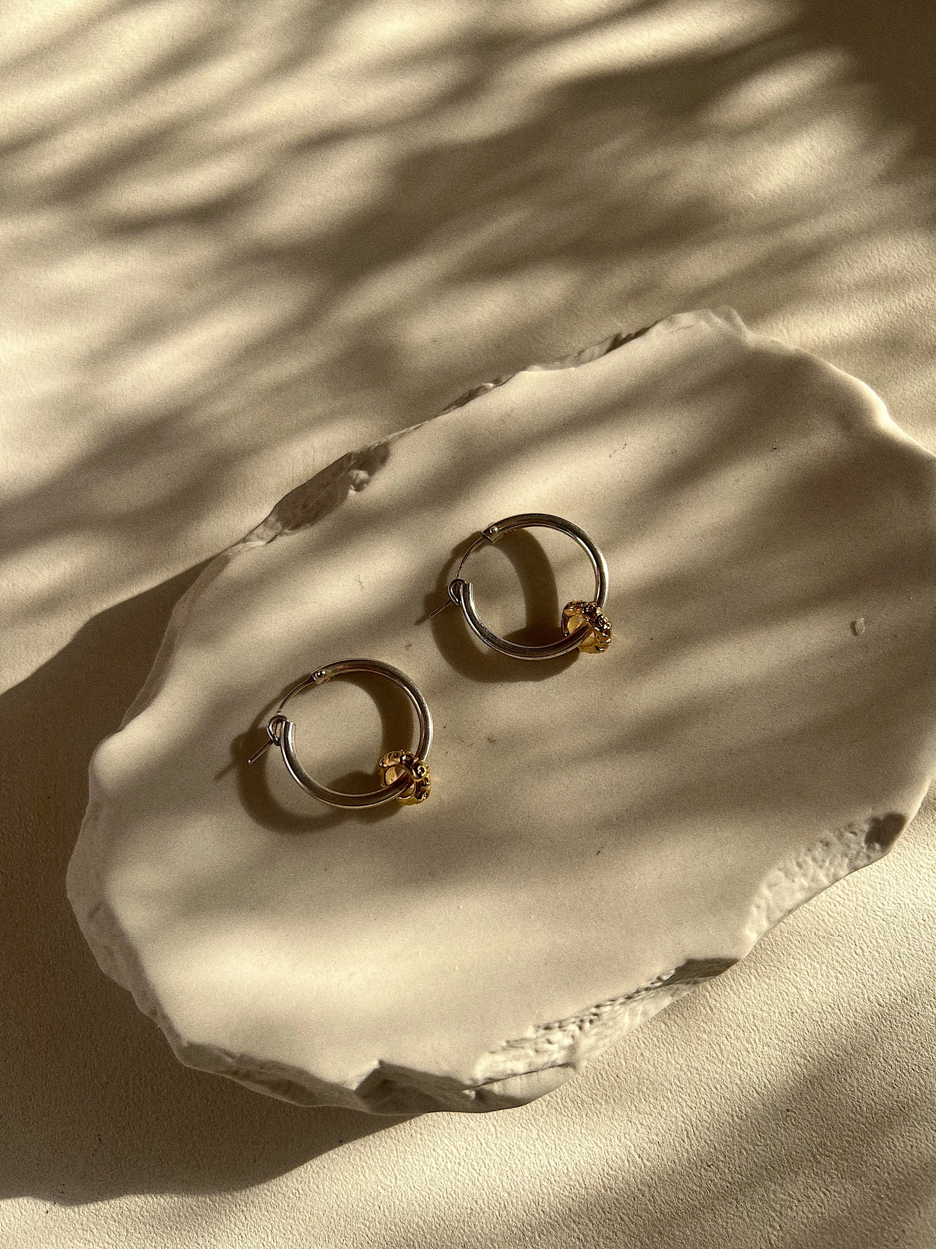 Mixed Metal Chunky Skull Hoops